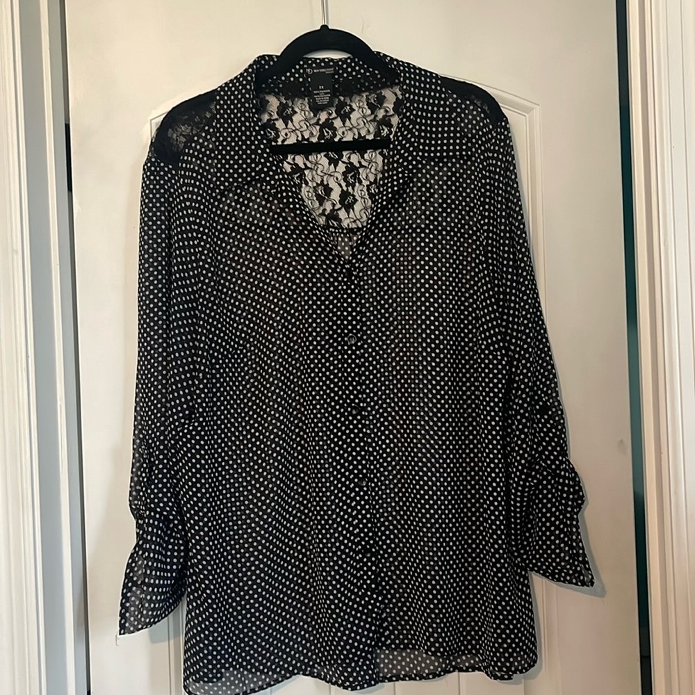 Black polka dotted V-neck button up blouse
